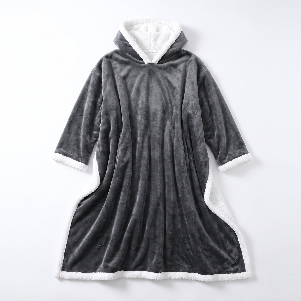 The Wearable Heated Blanket laid flat, showing the hood, two sleeves and sherpa trim.