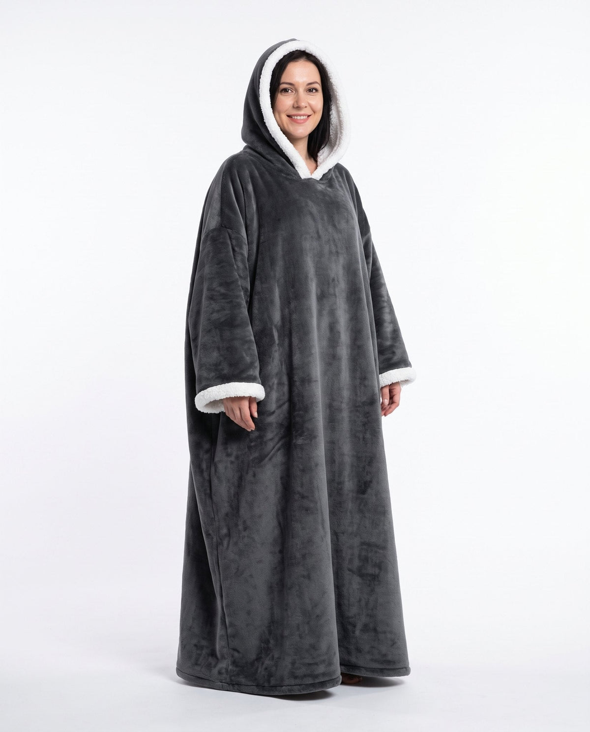 Wearable Heated Blanket worn with the hood up, closed front, full-length coverage